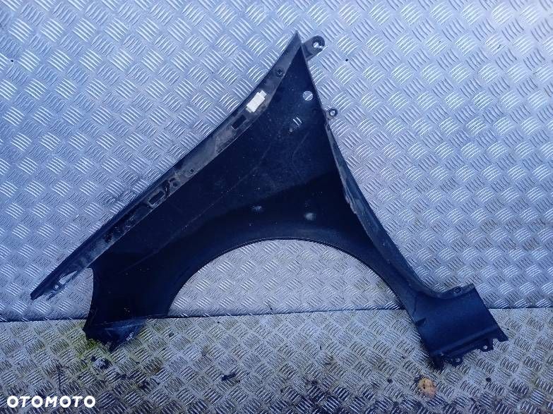 BŁOTNIK PRAWY PRZEDNI RENAULT CLIO 3 - 2