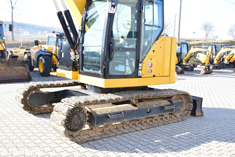Caterpillar 310 - 4