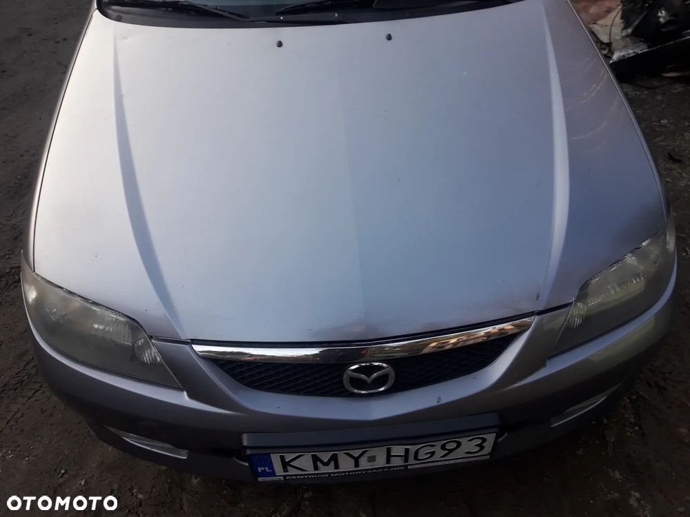 Mazda 323 323f BJ 01-03 Lift  Maska lampa zderzak pas atrapa 22V - 4