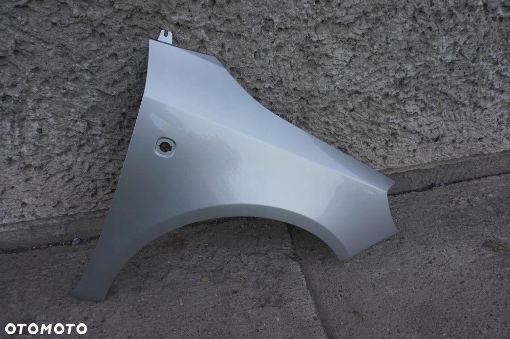 BŁOTNIK PRAWY SKODA FABIA II 2 ROOMSTER 9102 - 1