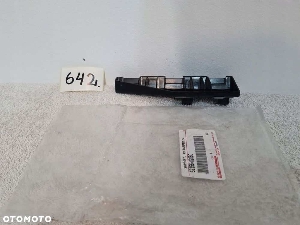 TOYOTA COROLLA E21 MOCOWANIE ŚLIZG ZDERZAKA LEWY TYŁ NOWY - 3