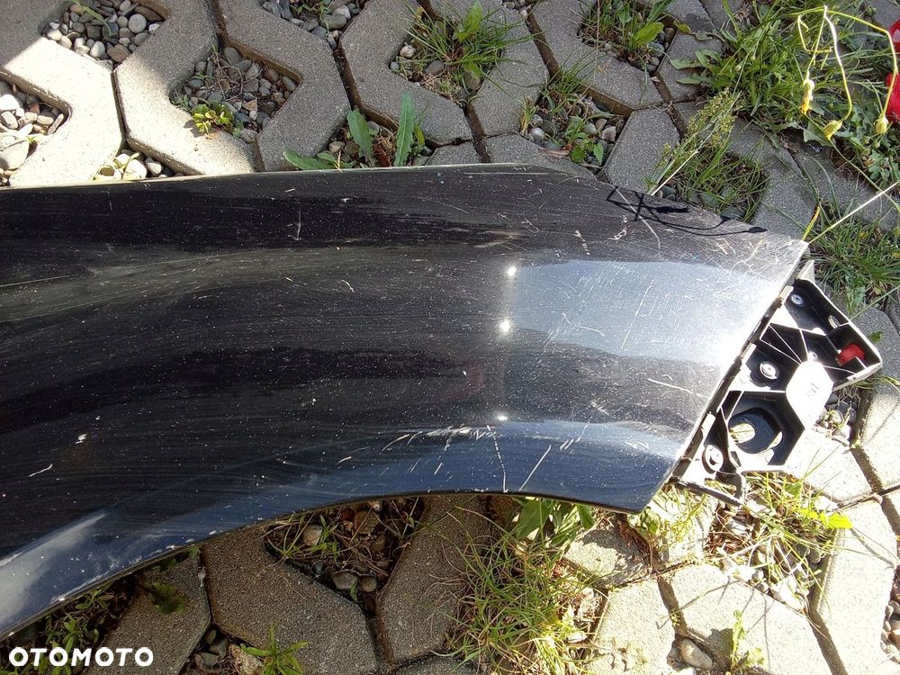 KL BŁOTNIK PRAWY PRZÓD OPEL CORSA D 06- 5D - 4