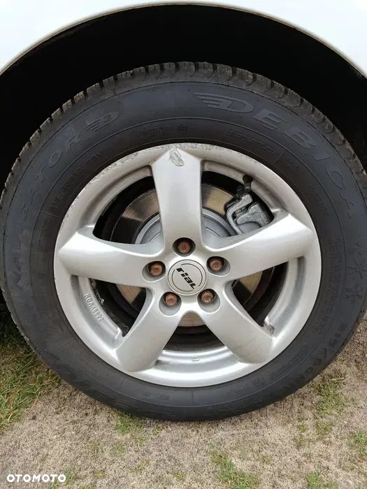 Całoroczne Dębica 215 60 16 z felgami - 1