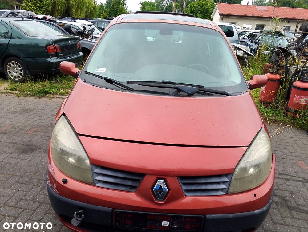 Renault Megane Grand Scenic II (03-06r.) 2.0B 134KM. Silnik F4R 770 ; F4R 771  Skrzynia ND0 015  Lakier TEB76 .Cały na części. GWARANCJA !!!  Przód Tył Zestaw Komplet Drzwi Klapa Zderzak Błotnik Maska Grill Atrapa Szyba Pas Lampa Lusterko Boczki Fotel Kanapa Kokpit Deska Rozdzielcza Przełącznik Włącznik Sterownik Przewody Wiązka Instalacja Moduł Komputer Czujnik Listwa Pompa Alternator Wtryski Głowica Rozrusznik Kompresor Sprzęgło Dwumas Silnik Skrzynia ABS Klimatyzacji Paliwa Wspomagania Kolektor Turbina Przepustnica Zawór Chłodnica Koło Hak Belka Sanki Zawieszenie Mcpherson Półoś Amortyzator Wydech Tłumik Zacisk Most - 2