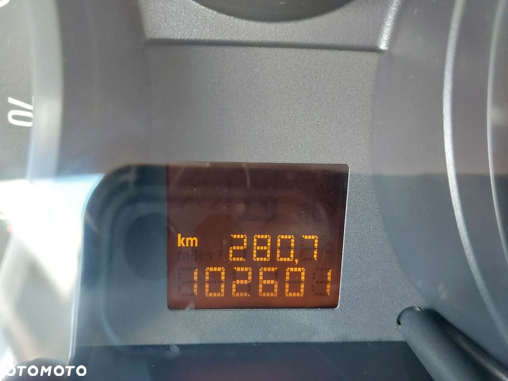 Opel Corsa 1.2 16V Enjoy - 23