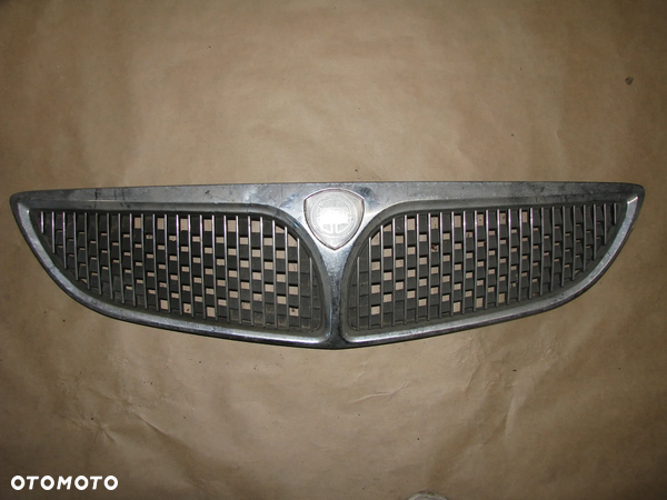 ATRAPA  GRILL LANCIA LYBRA 46557286