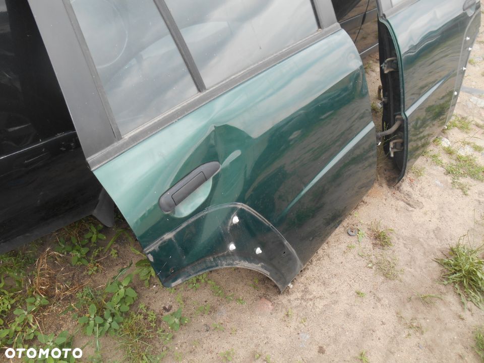 Drzwi prawe tył tylne Nissan Patrol Y61 lift GU4 3,0 Diesel - 4