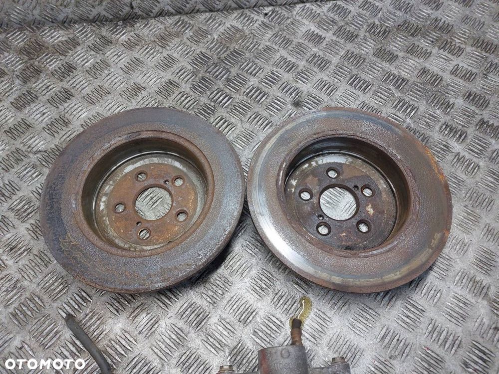 TARCZE HAMULCOWE TYŁ + ZACISKI TOYOTA AVENSIS T25 - 5