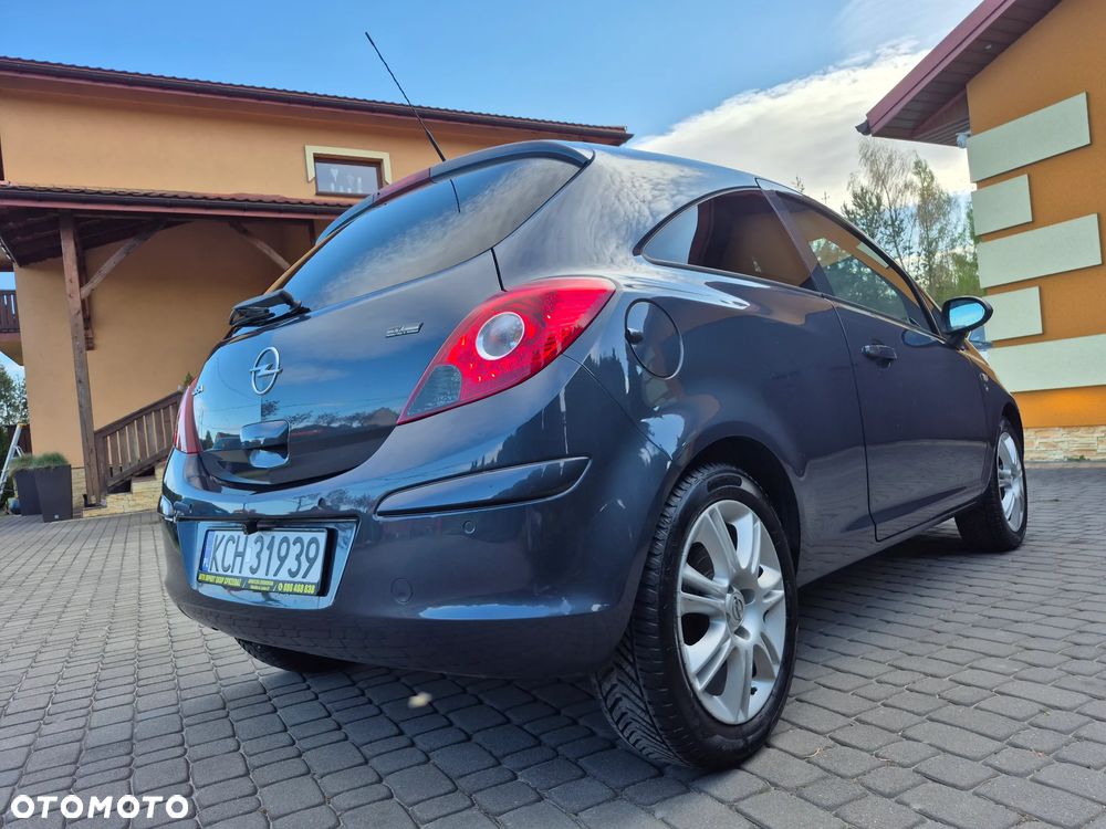 Opel Corsa 1.4 16V Cosmo - 7