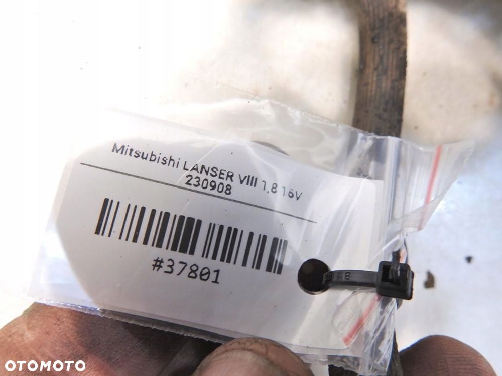 ZACISK HAMULCOWY PRAWY PRZÓD MITSUBISHI LANCER VIII 1.8 - 4