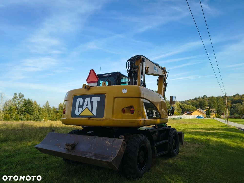 Caterpillar M313D - 6