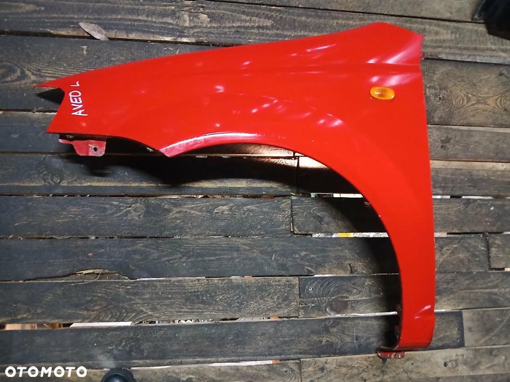 Chevrolet Aveo Błotnik lewy - 1