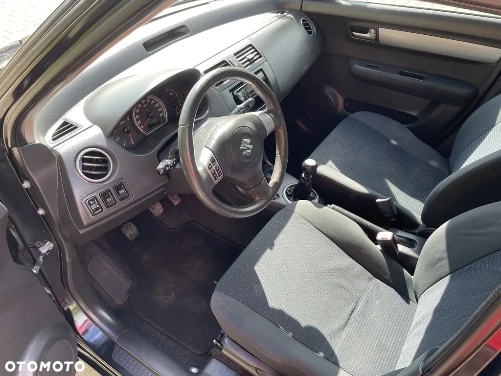 Suzuki Swift 1.3 DDiS 16v GLX - 9