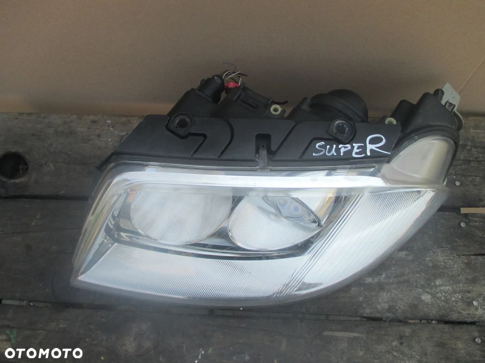 lampa lewa Passat B5 lift Hella Europa - 2