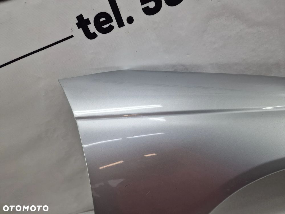 OPEL OMEGA C 99-02 SREBRNY PRAWY BŁOTNIK PRZEDNI PRZÓD , NR AUKCJI BŁ179 - 5