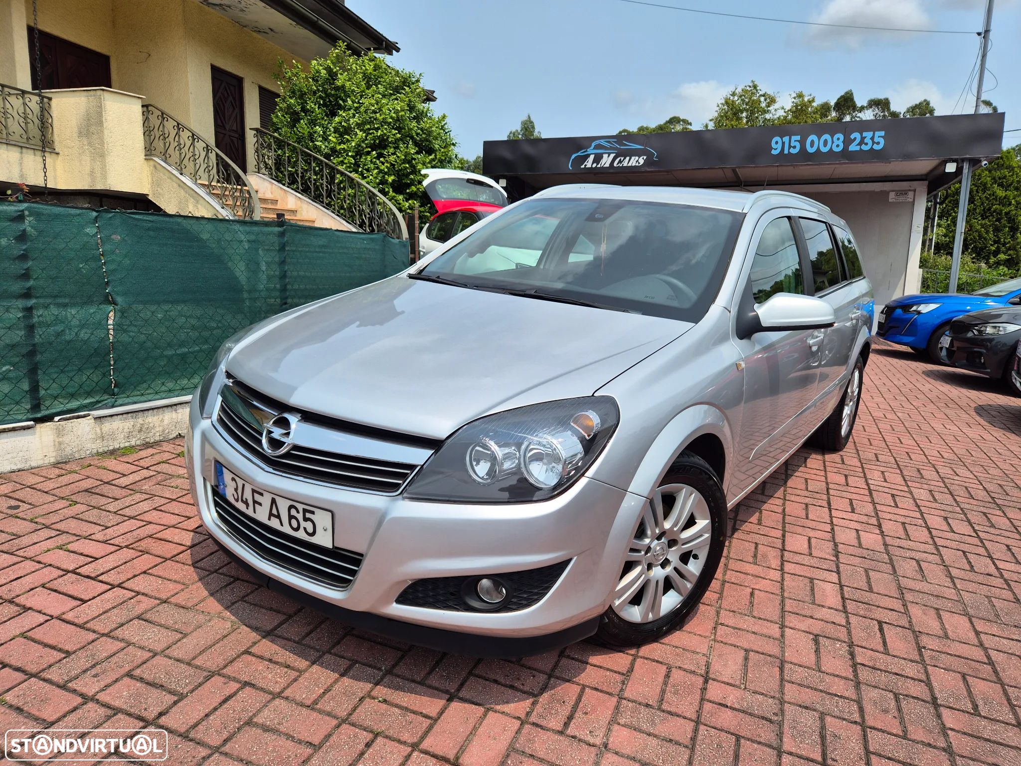 Opel Astra Caravan 1.3 CDTi Cosmo - 1