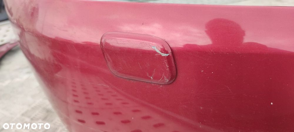 SPRYSKIWACZ REFLEKTORA LAMPY LEWY LANCER VII R20 - 2