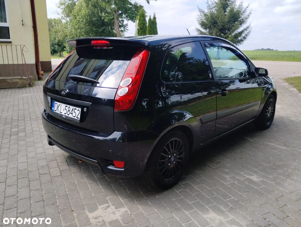 Ford Fiesta 1.4 Ghia - 10