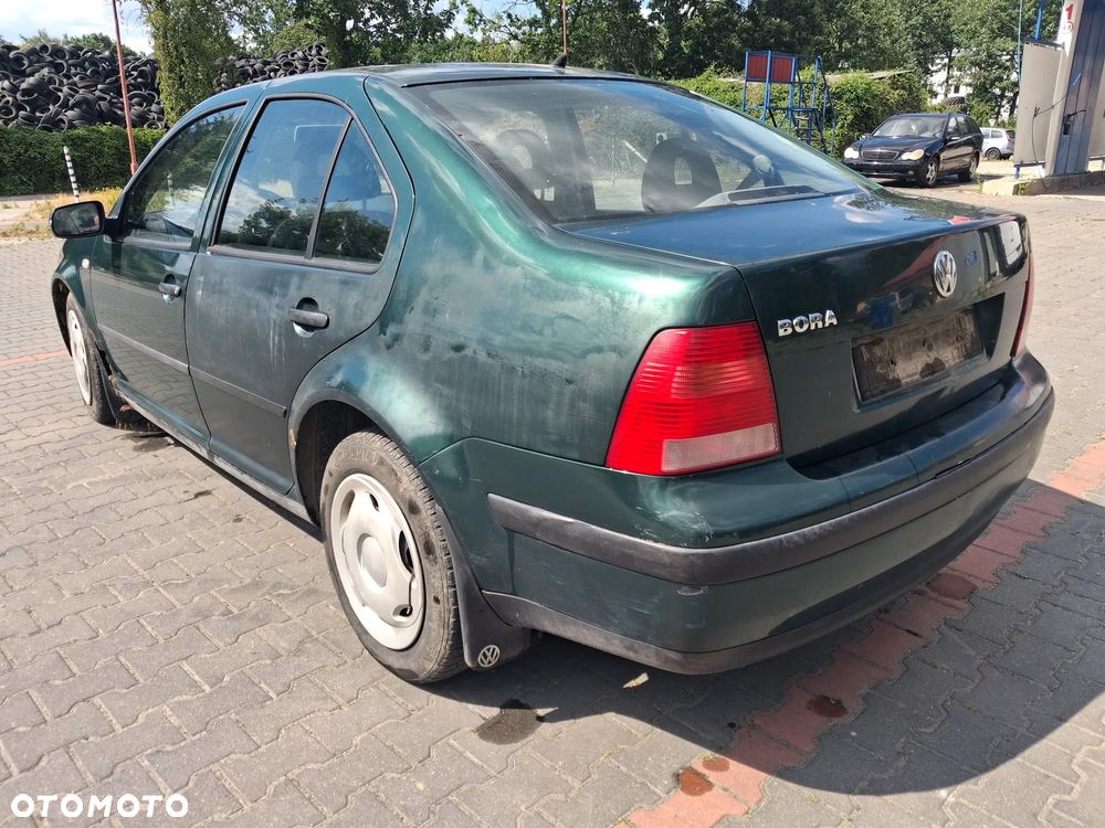 Volkswagen Bora Golf IV 4silnik 1.4 16v 55 Kw 75 KM skrzynia biegów DUU DLP DUW DUS drzwi maska zderzak klapa LC6M lampa grill atrapa lusterko panel sterownik moduł przewód wąż wiązka lewarek maglownica cewka kolektor tłumik wydech alternator rozrusznik fotel kierownica sterownik stacyjka belka sanki mcperson zwrotnica zacisk hamulcowy serwo pompa abs paliwa schowek szyba zamek czujnik sonda sprężarka klimatyzacji zbiorniczek podszybie wahacz zwrotnica NA CZĘŚCI - 10