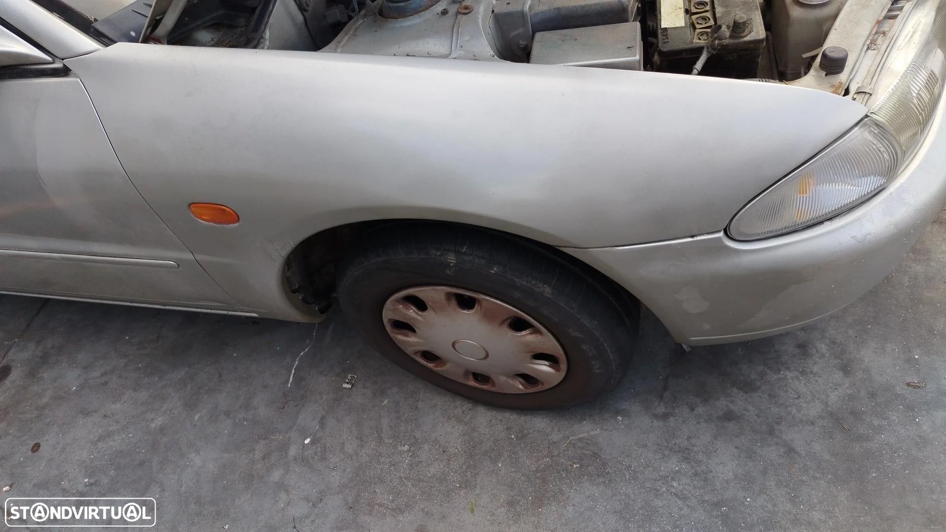 Guarda-lamas direito MITSUBISHI Colt IV (CA_A) - 1