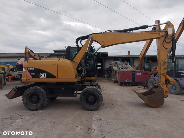 Caterpillar Cat M313D 8330 mtg Bez Edblue i DPF z Niemiec