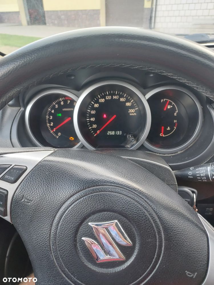 Suzuki Grand Vitara 2.0 - 7
