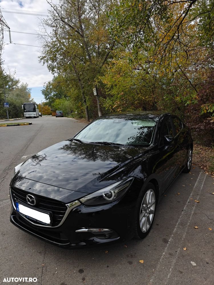 Mazda 3 G120 AT Revolution - 1