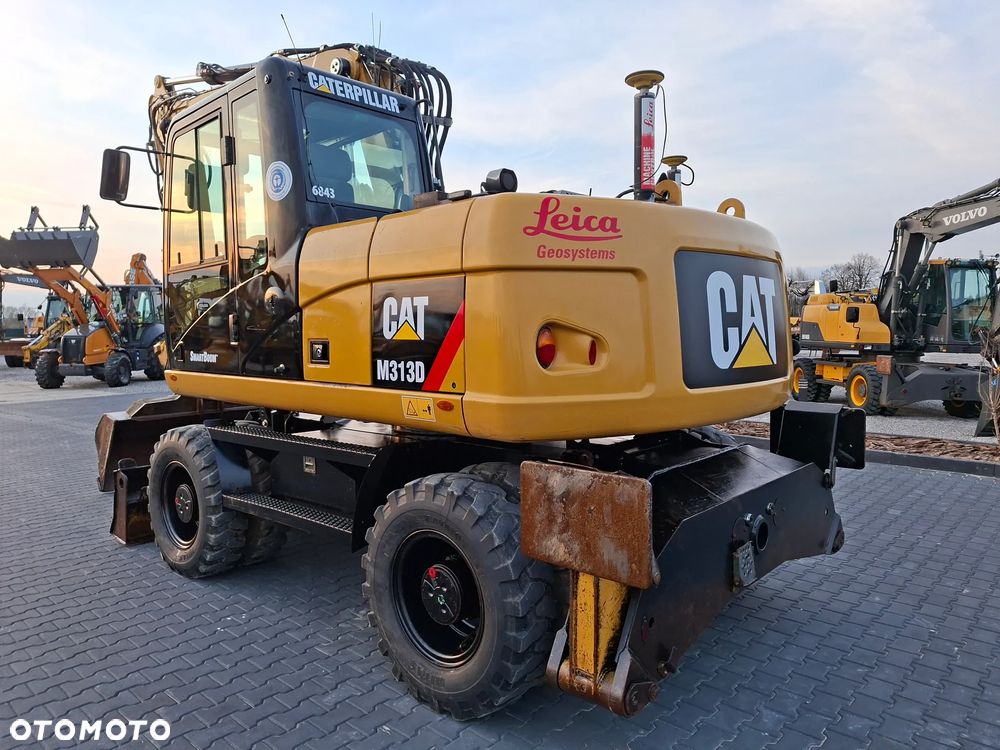 Caterpillar CAT M313D Niwelacja 3D Leica - 3