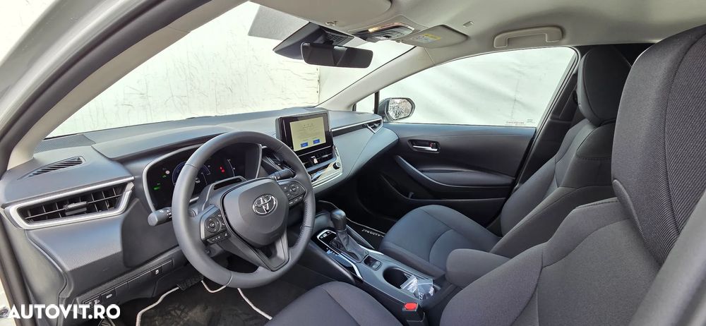 Toyota Corolla 1.8 HSD Eco - 11