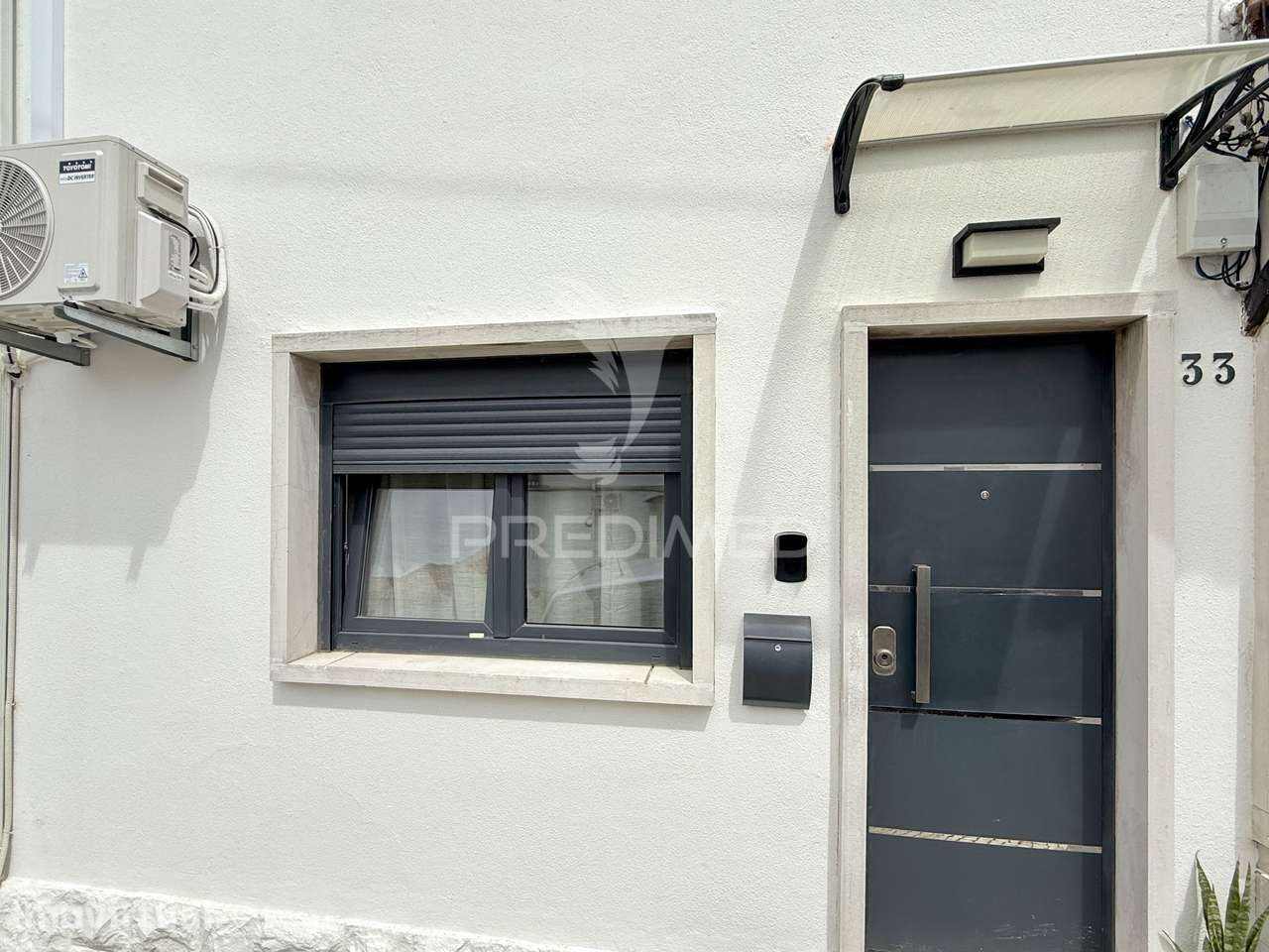 Moradia T2+1 com quintal totalmente remodelada em Almada - Grande imagem: 2/37