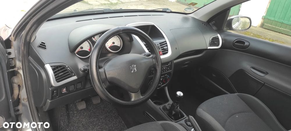 Peugeot 206 plus 75 - 12