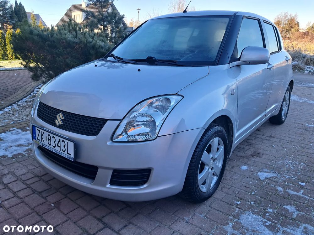 Suzuki Swift 1.3 Club - 4
