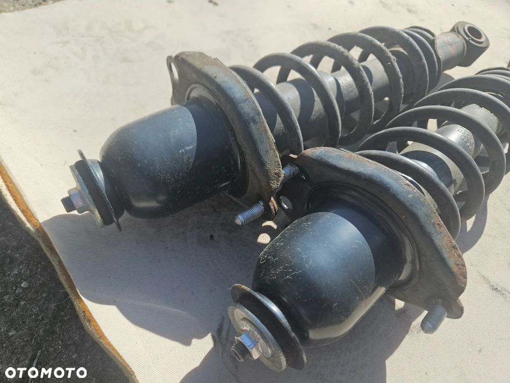 Amortyzator sprężyna lewy prawy tył tylny Toyota Prius II 1,5 hybrid 2005r - 2