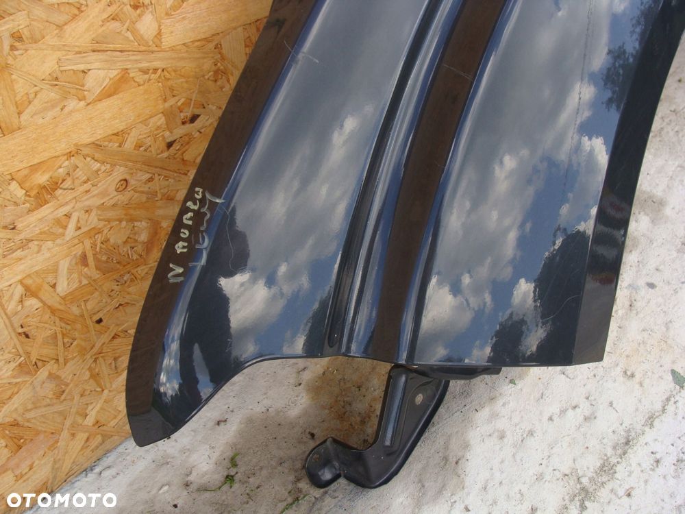 błotnik lewy nissan navara d40 bez rdzy !! - 2