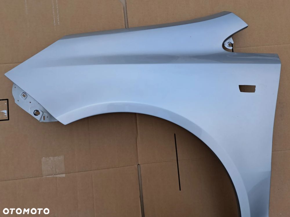 Błotnik przód lewy Opel Corsa D kod lakieru Z157 - 2