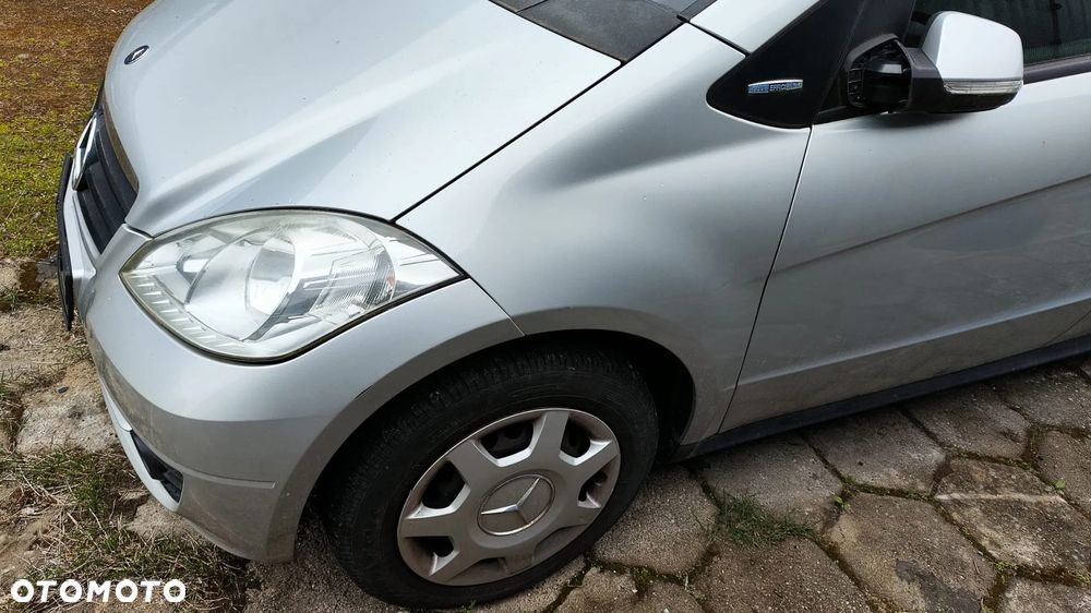 BŁOTNIK LEWY KOLOR SREBRNY 761 ORYGINALNY LAKIER MERCEDES A-KLASA W169 LIFT