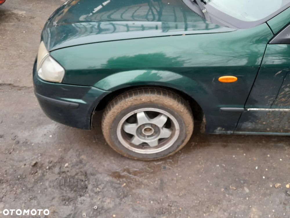 Mazda 323 323f 323  BJ 98-03  Maska lampa zderzak atrapa w kolor 18J - 7