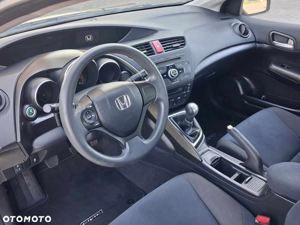 Honda Civic 1.4 i-VTEC Comfort - 24