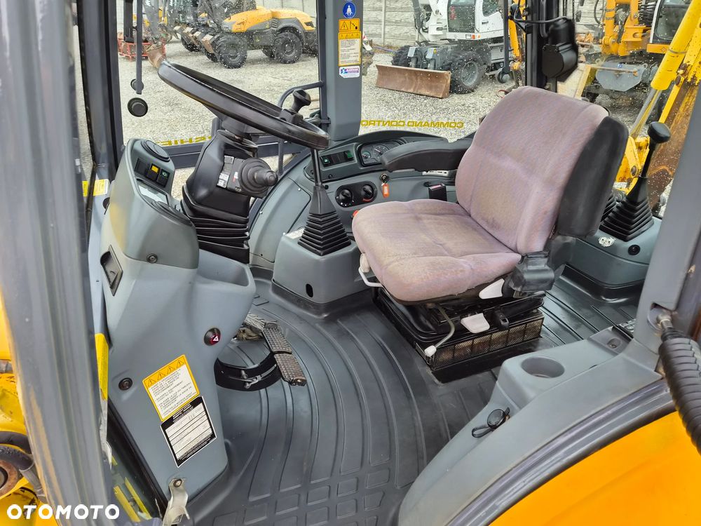 New Holland LB 115 - 16