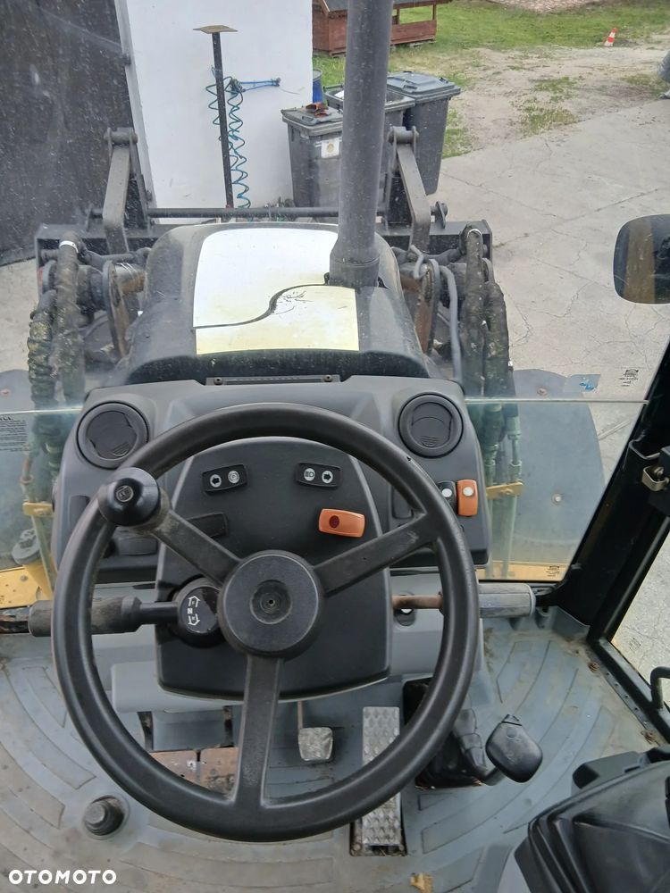 Caterpillar 428 E - 12