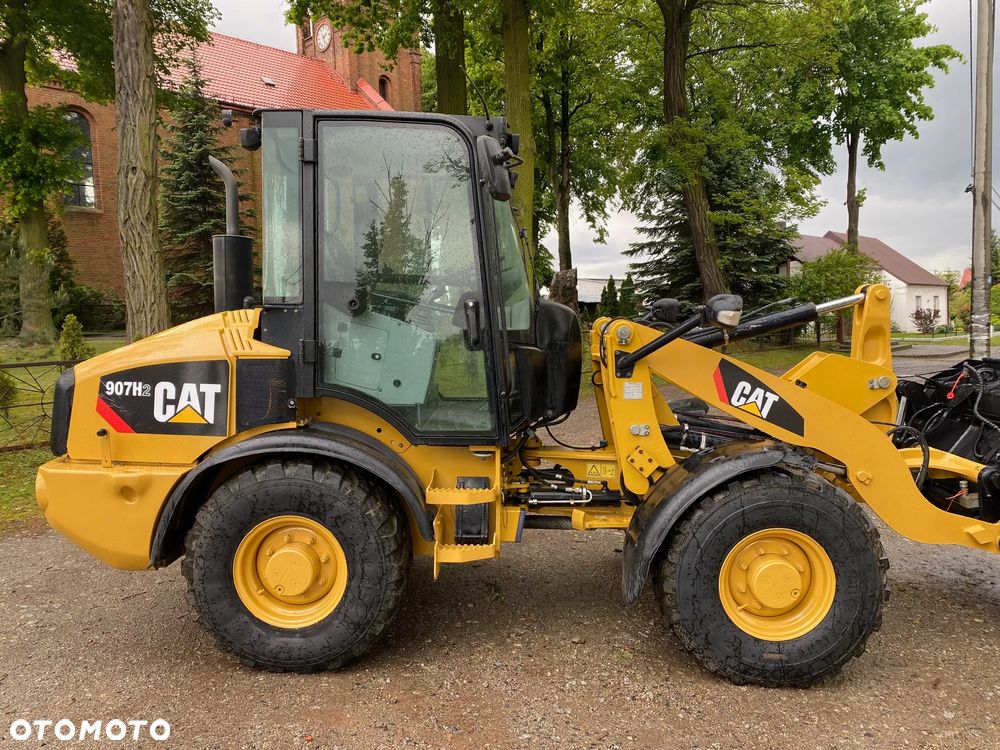 Caterpillar CAT 907H2, 2014 ROK, 6000 MTH, ŁYŻKA OTWIERANA + WIDŁY, z NIEMIEC, SUPER STAN, - 13