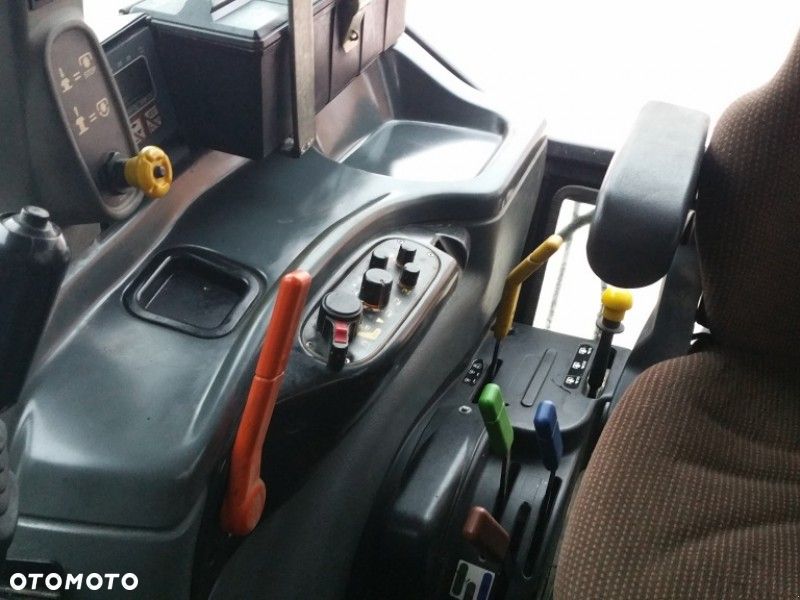 New Holland TL 100  , Rok 2003 - 3