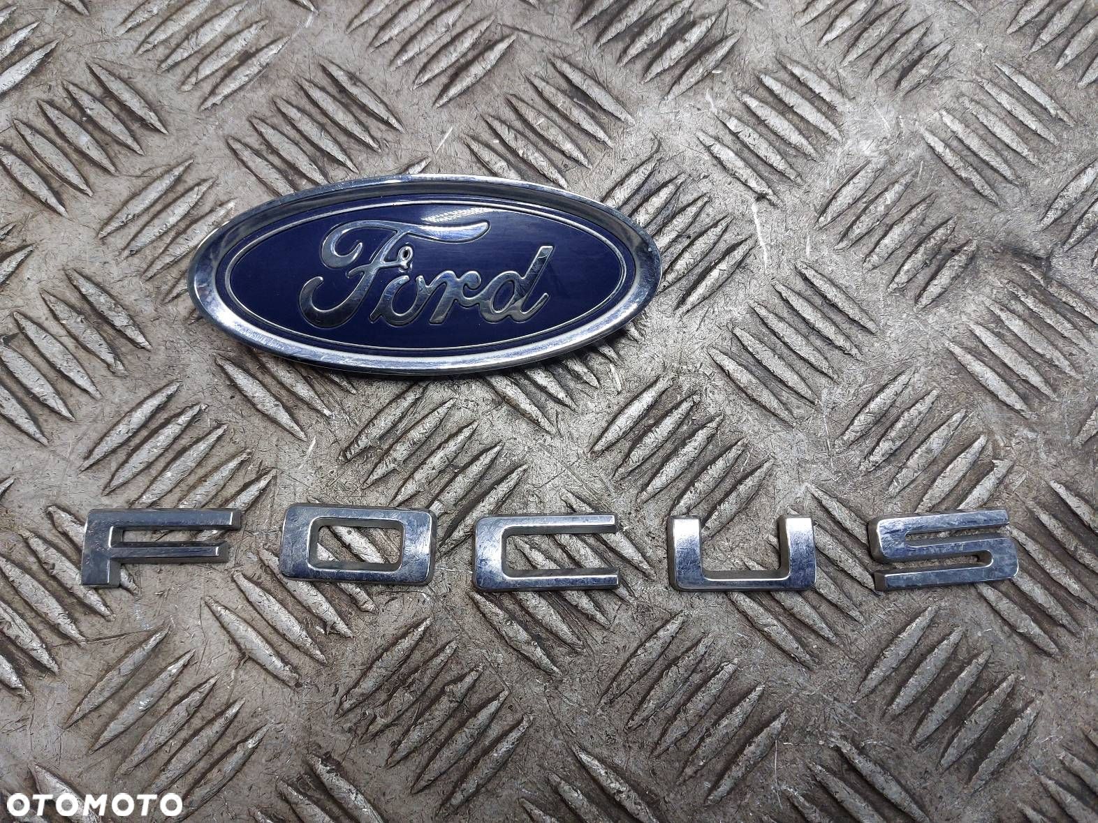EMBLEMAT ZNACZEK LOGO KLAPY BAGAŻNIKA FOCUS MK4 KOMBI F1EB-402A16-AB - 1