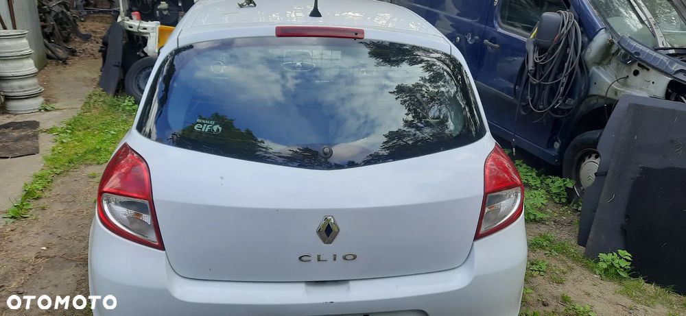Renault Clio III Clio 3 FL 3 Lakier dv369  tył Belka zderzaka 8200807041 , ślizg mocowanie zderzaka tył 8200290037 8200290041nadkole tył 8200781187 82002891943 8200781186 8200289942 , Nadkole lewy przód 8200289945 - 1