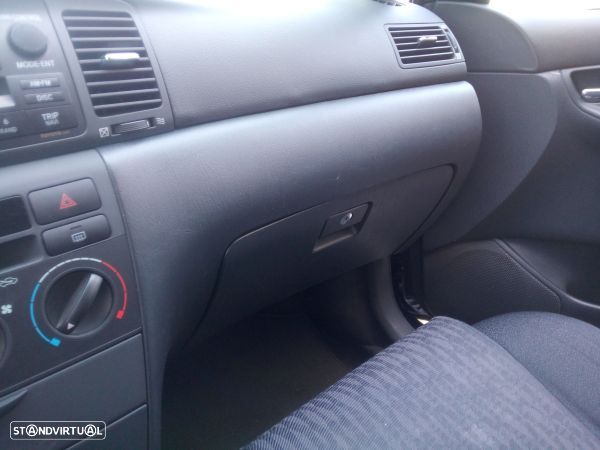 Porta Luvas Toyota Corolla (_E12_) - 1