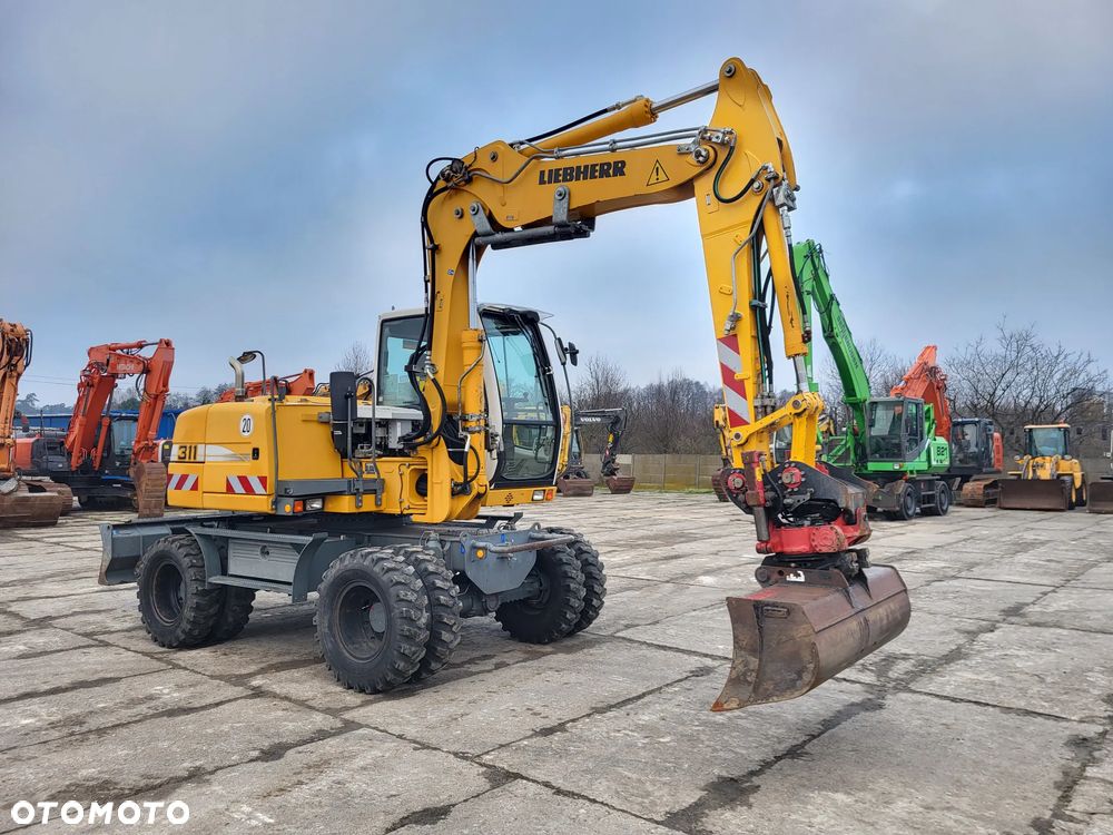Liebherr A 311 spr z Niemiec tylko 6200mtg - 6