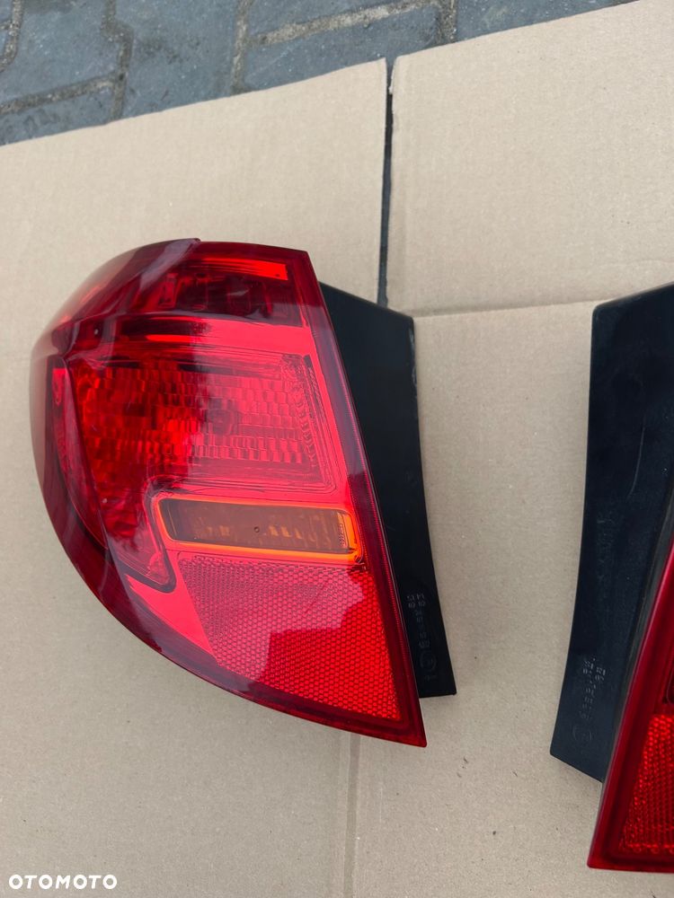 Opel Meriva B lampa tylna lewa  13253627 13253628 - 1
