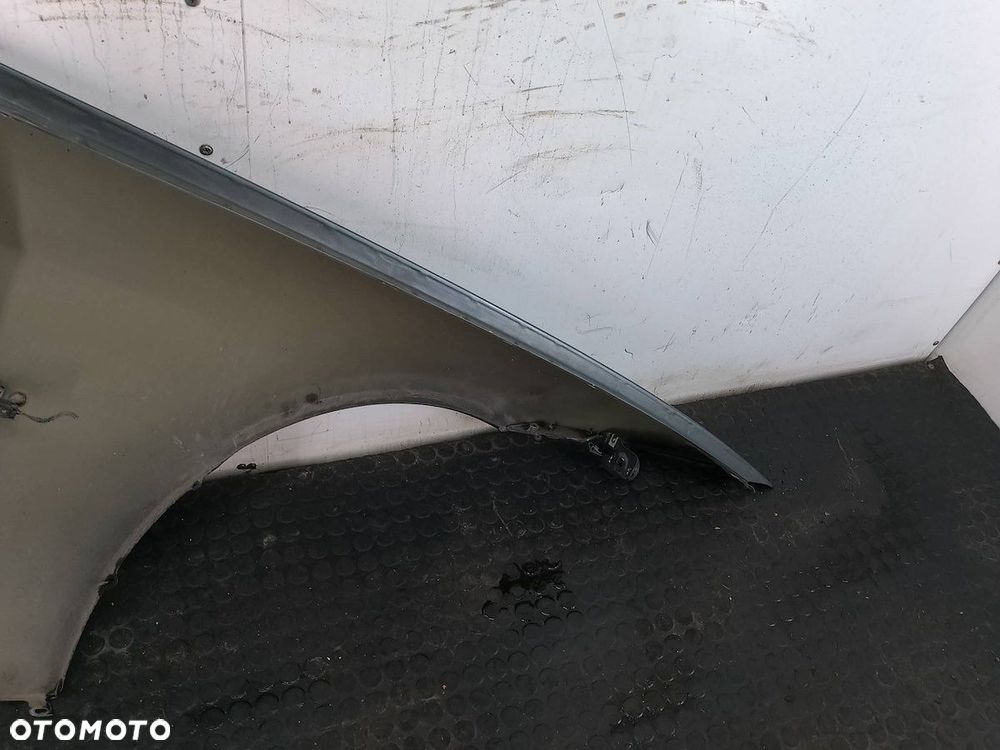 BŁOTNIK LEWY PRZÓD BMW E91 A81/6 - 9