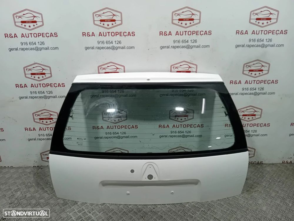 Tampa Porta de Mala Opel Corsa B 5 Portas Original - 1