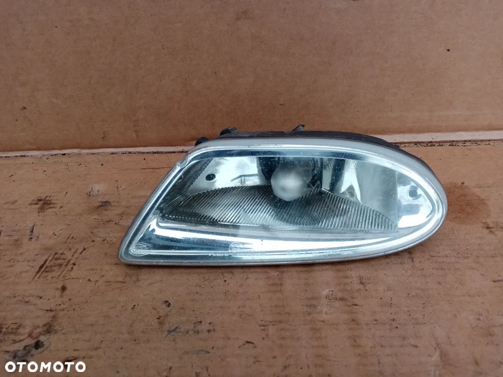 Halogen lewy przód przedni HELLA Mercedes ML W163 A1638200328 - 1